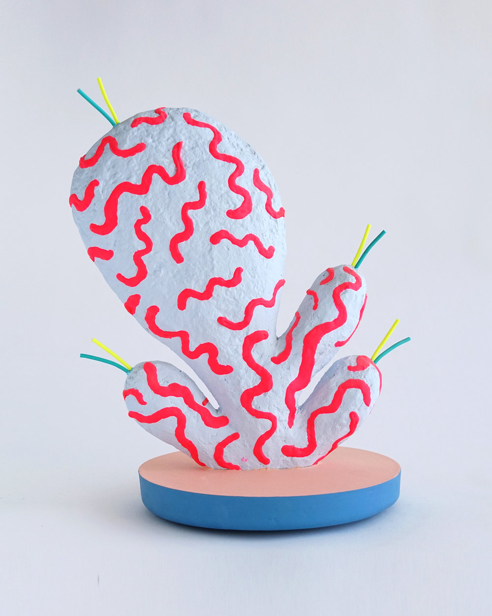 ADAM FREZZA + TERRI CHIAO - Squiggle PaddleAcrylic and rubber tubing on paper pulp and plaster with painted concrete base11 x 8 x 13”